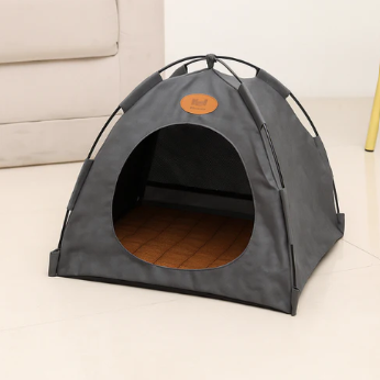Gray pet tent on a light-colored floor with a beige couch in the background