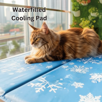 Cat lying on a waterfilled cooling pad with snowflake patterns, indoors.